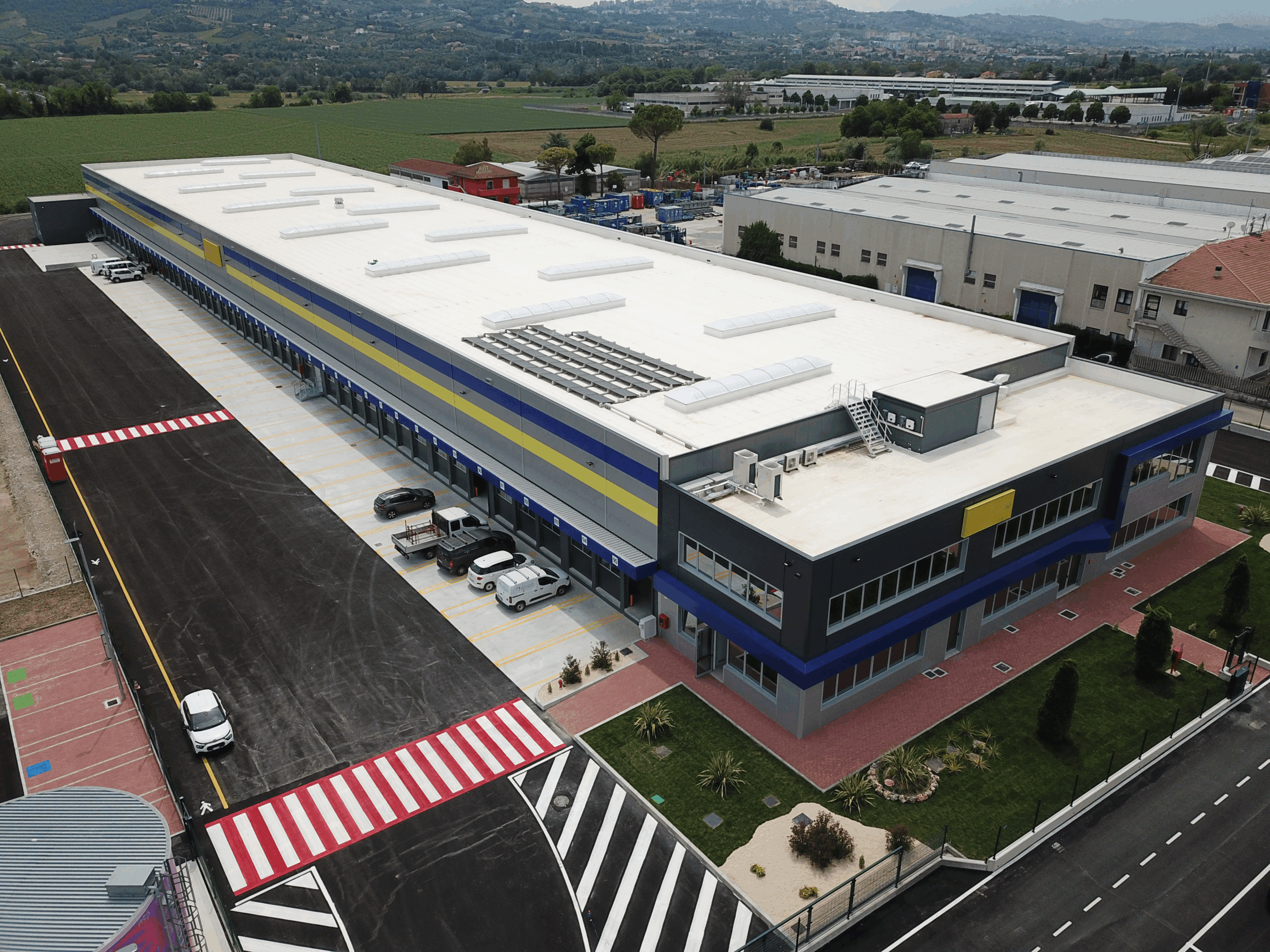 alt="Copertura industriale" alt="Impermeabilizzazione manto sintetico"